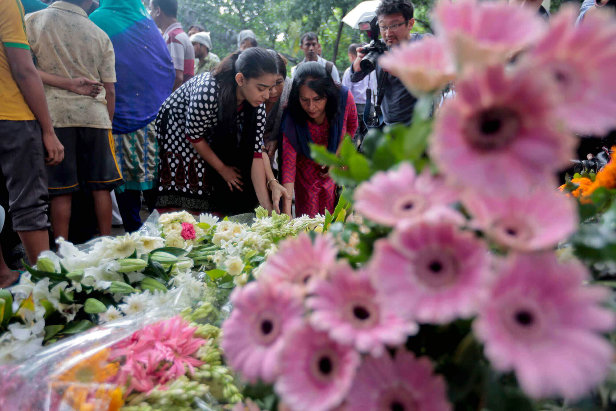 Memorial of flowers set up for the vicitms of the Bangladesh attack.