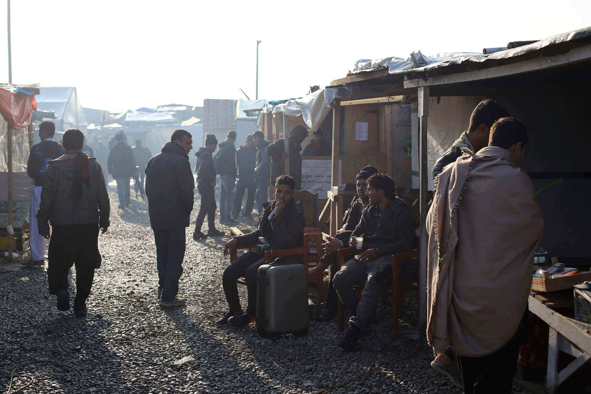 Image of migrants in French refugee camp